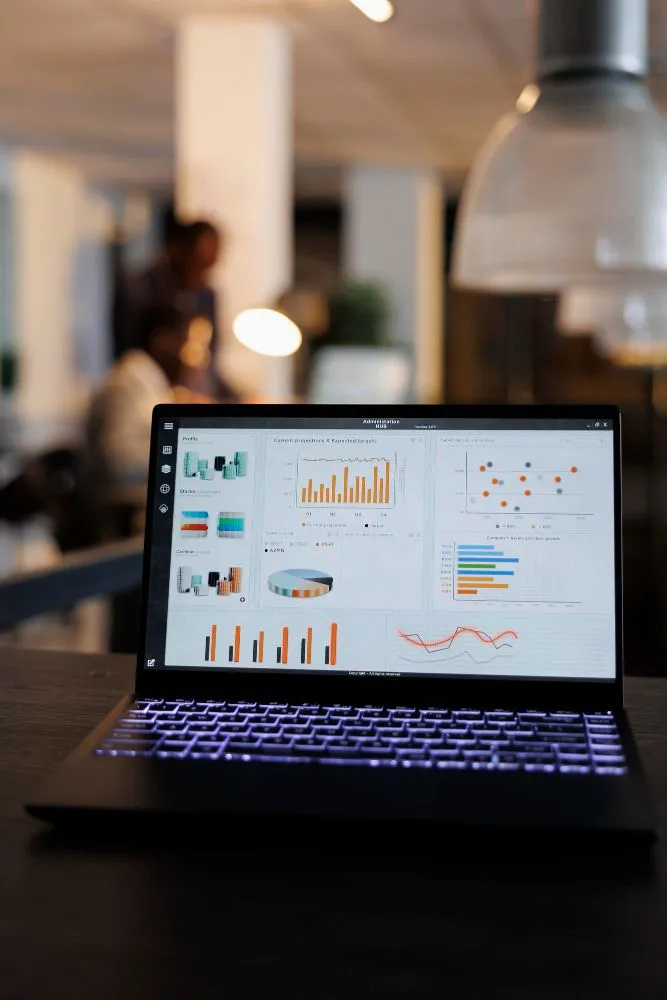 Laptop displaying SEO analytics and search performance charts